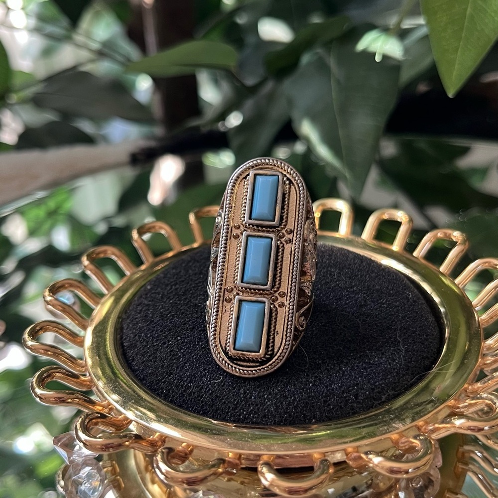 Intricate Silver Ring with Turquoise Accents